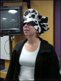 Between recipes, Sarah from the third floor takes a moment to try on my hat.