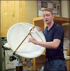 And telling us all about the GBT as well as radio astronomy is this guy. He was a good presenter, but he had a few factual errors. He also showed us how liquid nitrogen works, with us freezing pennies and then smashing them with a hammer. Fun!