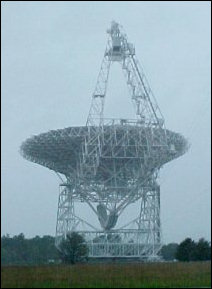 From this different vantage point, you can get a good look at the lower-works of the GBT. Also, note that this was a rainy day when we visited. This would prevent your typical backyard astronomer from seeing the sky, but the GBT doesn't have that problem. Since it's a radio telescope, it can operate in any kind of light and under any kind of weather except for the most severe storms (and then only in order to protect the telescope from damage).