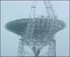 From this different vantage point, you can get a good look at the lower-works of the GBT. Also, note that this was a rainy day when we visited. This would prevent your typical backyard astronomer from seeing the sky, but the GBT doesn't have that problem. Since it's a radio telescope, it can operate in any kind of light and under any kind of weather except for the most severe storms (and then only in order to protect the telescope from damage).