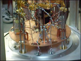 This lower part of the collector must be kept very cold to keep waves generated by heat from causing a false reading. How cold? How does a few degrees above absolute zero sound?