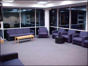 Welcome to the TV lounge! Color TV, now with 70+ channels, provided we have a coaxial cable hooked to the TV, adequate seating, and a view of the Harrisonburg skyline.