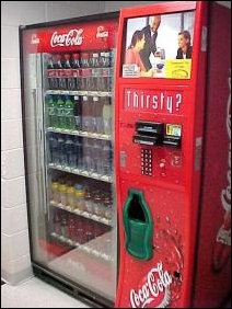 On the freshman side, we have the "cool" vending machine, due to the conveyor belt that rises up, picks up your drink, then ferries it to the green receiver section, ready for you to enjoy it.