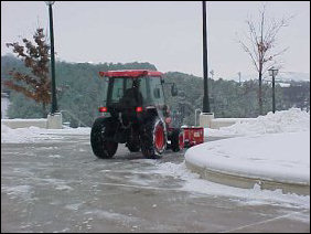 Getting there, I went through the building (hey, it's warmer), and encountered the snow-plow, clearing the snow.