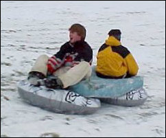 Their next attempt was to use two tubes as runners to slide the mattress down the hill. This, unlike the previous attempt, worked.