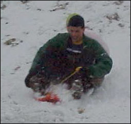 While the mattress-people did that, Raleigh and Lindsay got up the hill above the sidewalk, and sledded down that into the sidewalk.