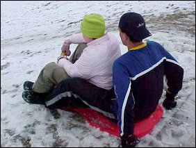 All the while, Raleigh threw caution and his jacket into the wind, calling the day "unnecessary risk day", and went down the hill again with Lindsay, this time putting her in front, because he couldn't steer to save his life.