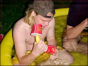 According to Chris, you never know how a banana and a Festival cup can be used, as Chris uses the two as a telephone, and as a firearm.