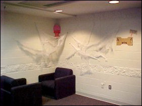 Three sides were Halloween... the one side that was concrete had a spider web on it, and the two glass sides were festively decorated with images made with spray-snow.