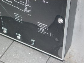 The fire panel didn't fare too well in the incident, as the sprinkler head in question was right above it. You can see that the graphic annunciator took on some water. It actually took on enough to short-circuit, necessitating disconnecting it. Here, though, you can see the amount of water in the front of it...