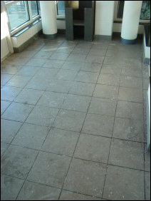 Most of the floor was covered with salt, in order to prevent the floor from freezing over while there was water on it. This was in addition to residue from the sprinkler grease and people tracking whatever else in.