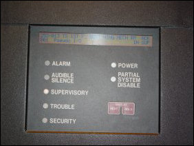 Interestingly enough, the alarm system was showing a "Supervisory" condition after the front panel was reconnected, and the screen, instead of the usual date, time, and location, showed what was going on in Supervisory mode. Click the images above to get a better look at what the panel was showing on the screen.