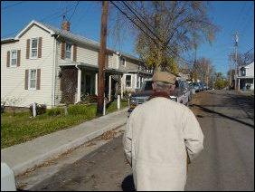 From Cantrell Avenue, we went down a small set of stairs, and entered a cul-de-sac at the end of Old South High Street, part of a residential neighborhood. Old South High Street is so named because it used to be South High Street up until the 1960s when South High Street was widened. Since widening this street was not feasible, requiring demolition of the entire neighborhood, it was instead determined to build the widened South High Street along the edge of the neighborhood and close off what became Old South High Street with a cul-de-sac. From Cantrell Avenue, we went down a small set of stairs, and entered a cul-de-sac at the end of Old South High Street, part of a residential neighborhood. Old South High Street is so named because it used to be South High Street up until the 1960s when South High Street was widened. Since widening this street was not feasible, requiring demolition of the entire neighborhood, it was instead determined to build the widened South High Street along the edge of the neighborhood and close off what became Old South High Street with a cul-de-sac.