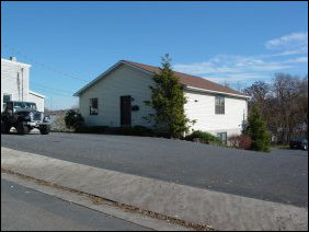 Most of the Old High Street neighborhood is single-family residential (above), though there is some high-density residential (below left), consisting of apartments where parking has replaced the front yard, and also medium-density residential (below right), in the case of this duplex where there is a couch in front of one of the entrances (strange, don't you think?). Most of the Old High Street neighborhood is single-family residential (above), though there is some high-density residential (below left), consisting of apartments where parking has replaced the front yard, and also medium-density residential (below right), in the case of this duplex where there is a couch in front of one of the entrances (strange, don't you think?).