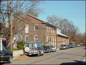 Up the street, this brick structure used to be an industrial facility, but has since closed its doors. Up the street, this brick structure used to be an industrial facility, but has since closed its doors.
