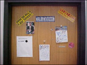 One of the few men's doors photographed, this door is typical of the men's doors which are decorated. So where is Easy Street? Answer is it's in Rogers, Arkansas, where there truly is a street called Easy Street (it's off of Dixieland Road). One of the few men's doors photographed, this door is typical of the men's doors which are decorated. So where is Easy Street? Answer is it's in Rogers, Arkansas, where there truly is a street called Easy Street (it's off of Dixieland Road).