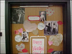 This door is covered with pictures with major "cute" value, as well as paper hearts to perfectly complement the pictures. This door is covered with pictures with major "cute" value, as well as paper hearts to perfectly complement the pictures.