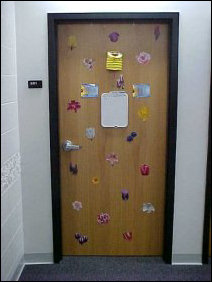 This door, covered with flowers, adds a nice touch to any hallway. This door, covered with flowers, adds a nice touch to any hallway.