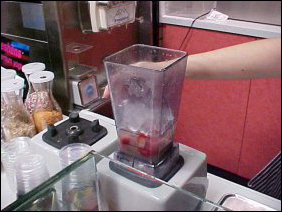 After he completed his order, I decided to order a smoothie myself. Funny how it works... one goes inside to get out of the cold, just to get a drink that's as cold as it is outside. Well, I guess if you're cold on the outside, you might as well have some equilibrium and get cold on the inside, too. Thus the ice with the strawberries. After he completed his order, I decided to order a smoothie myself. Funny how it works... one goes inside to get out of the cold, just to get a drink that's as cold as it is outside. Well, I guess if you're cold on the outside, you might as well have some equilibrium and get cold on the inside, too. Thus the ice with the strawberries.