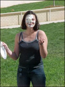 PIED!  There was a "Pie your hall staff" program on the Sunday before finals, and here the two Amys get it - right in the face.