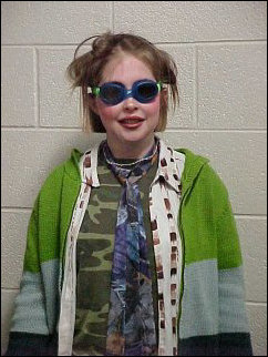 Wacky-Tacky Skate Night at Skatetown in Harrisonburg is not only fun, but it also benefits needy children.  While I will not participate (fear of embarrassment on skates), I love taking pictures of the people’s costumes.  I particularly like this costume, though it must have been extremely warm under all those layers.