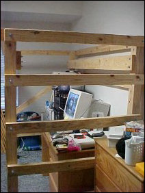 The thing that made the loft bed demolition particularly difficult was that I was taking it down around the computer, plus a wire was running across the room for Web Cam coverage.  Thus the rule was "do not damage, hit, or otherwise disturb the computer".  With a week to go, you see, and a lot of wires back there, it wasn't worth it to remove the computer before taking down the loft.