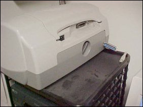 Following this went the printer.  Necessary, but I wasn't planning on printing anything in the next few hours, so out it goes.